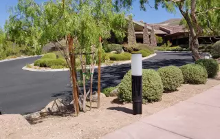 NxT solar bollard pathway lighting at parking lot.